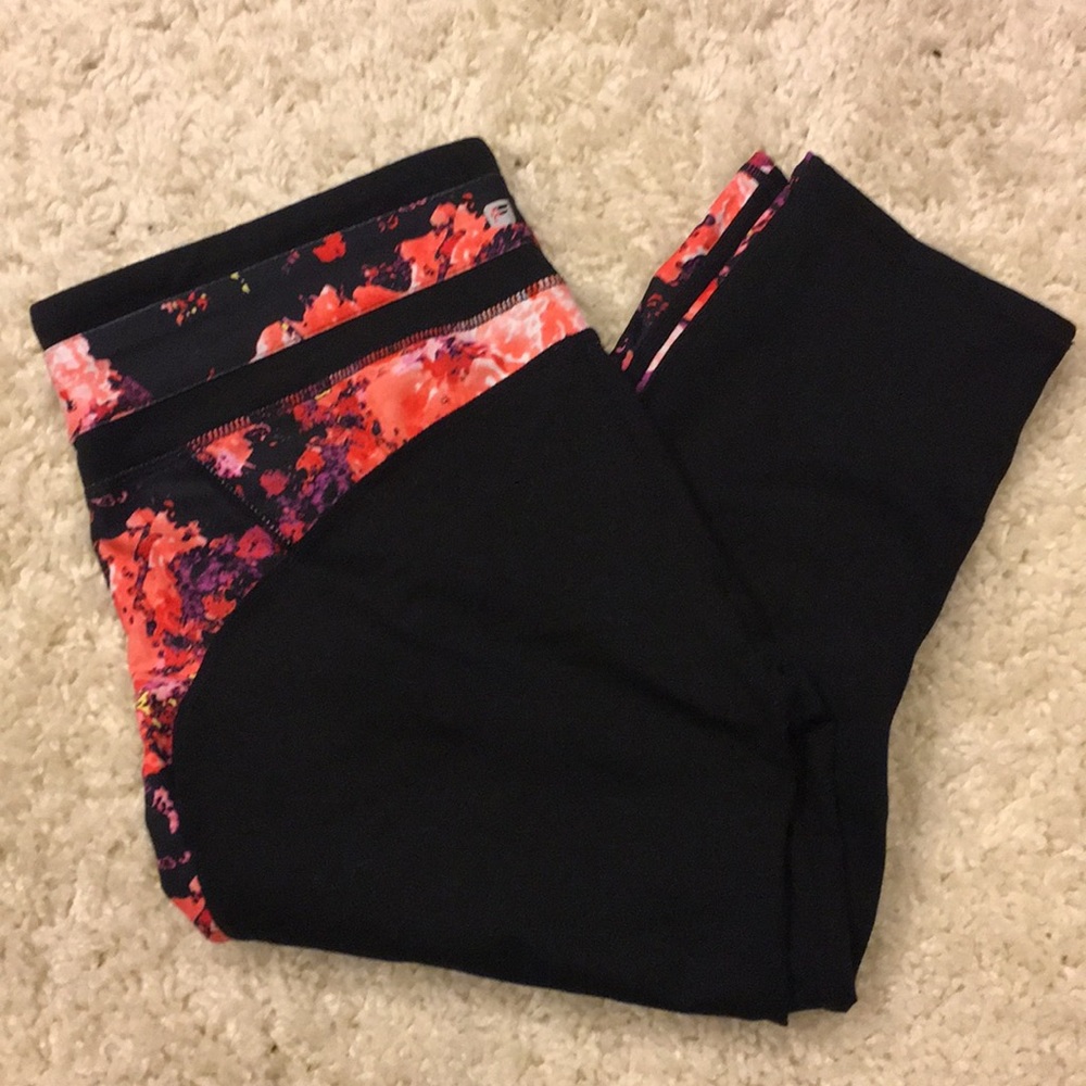 Floral design and black capri leggings.